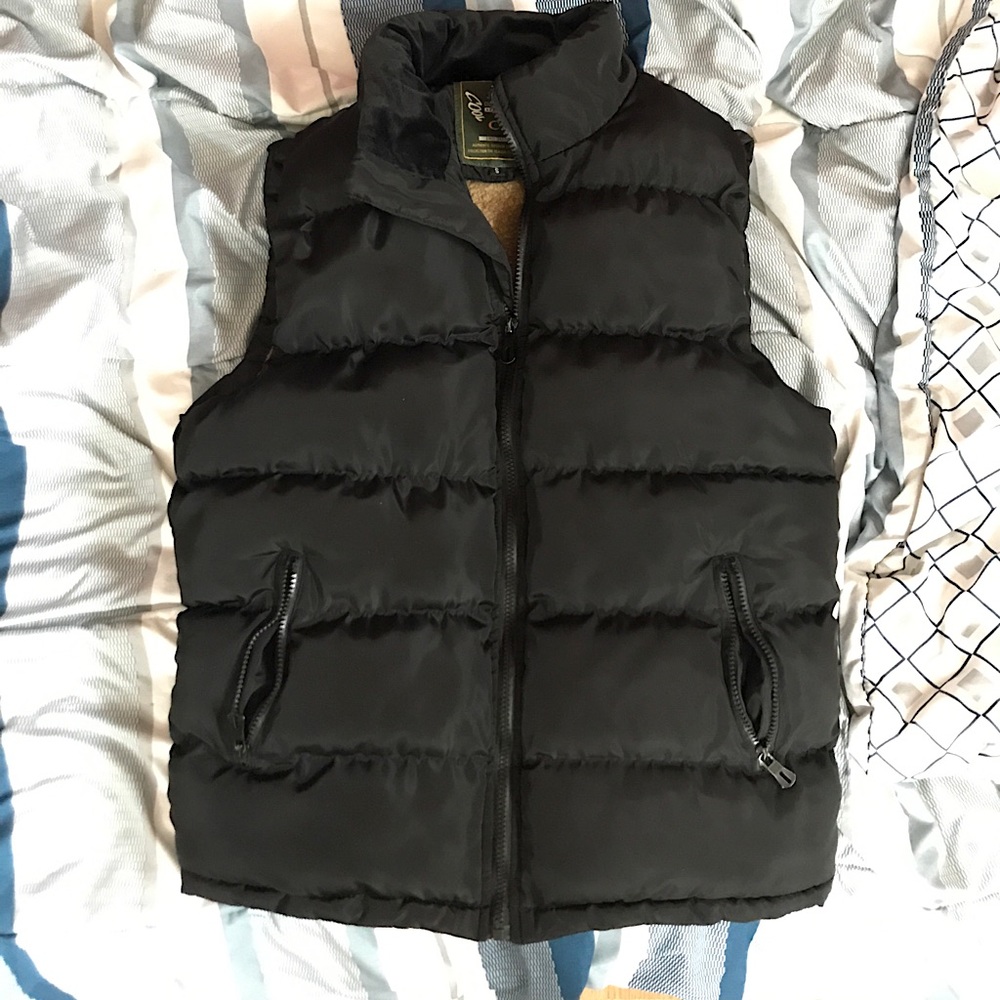 Two high quality 9/10 wear vests
